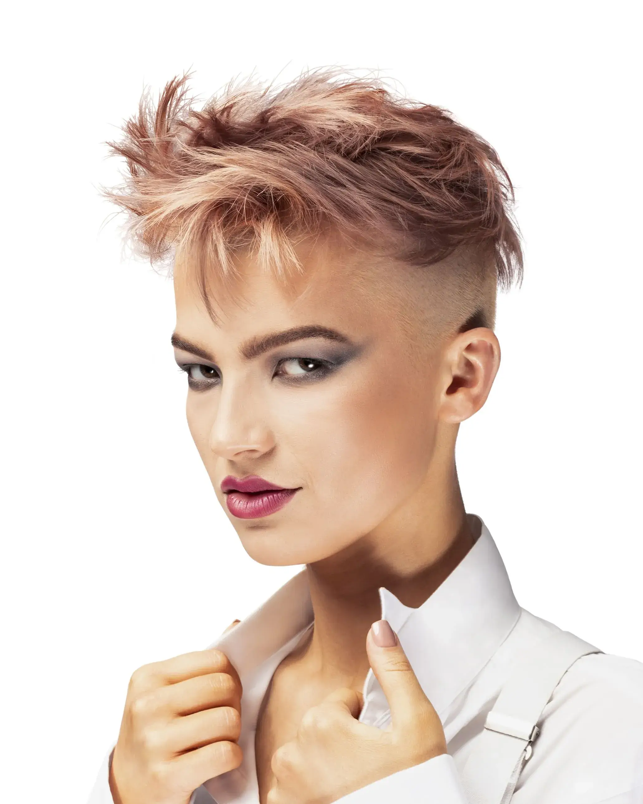Woman with rose gold short back and sides hairstyle in white shirt
